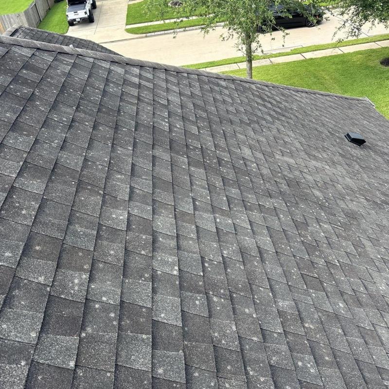 Architectural shingle roof with weathering and granule loss