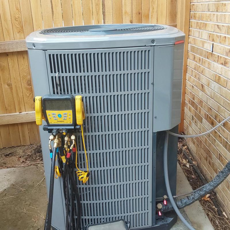 American Standard AC unit with diagnostic gauges attached
