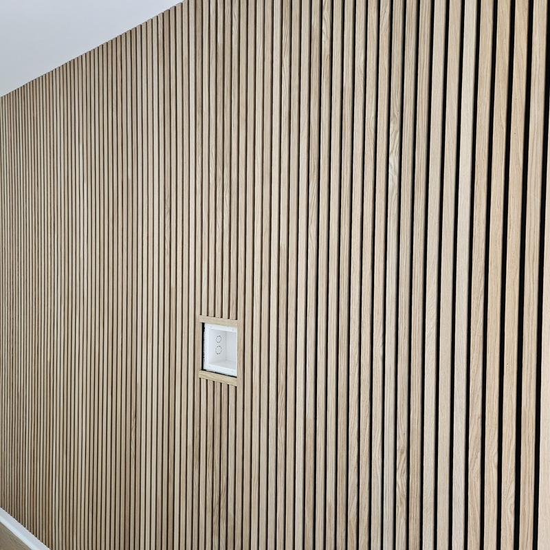 Wooden slat wall panel with electrical outlet box Wooden slat wall panel with electrical outlet box