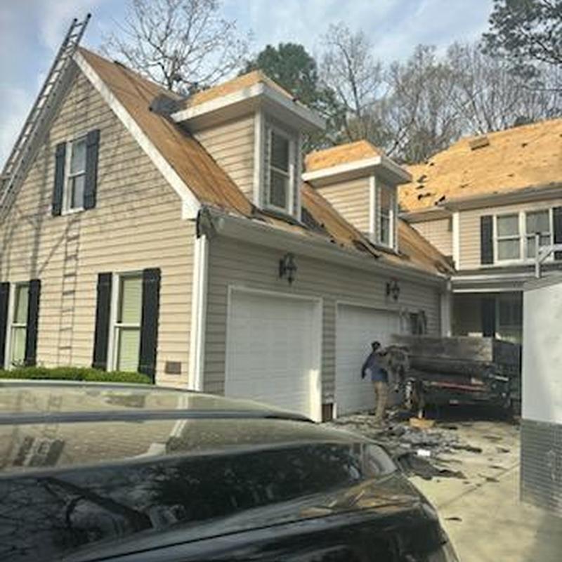 Roof sheathing removal on residential house in Raleigh Roof sheathing removal on residential house in Raleigh