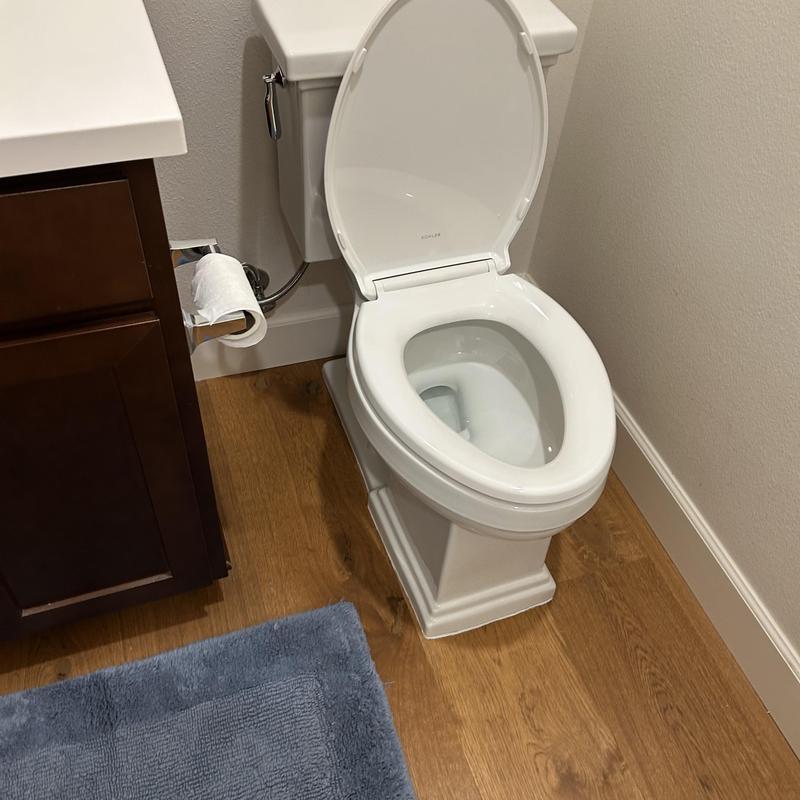 Toilet installation with customer-supplied fixture in bathroom