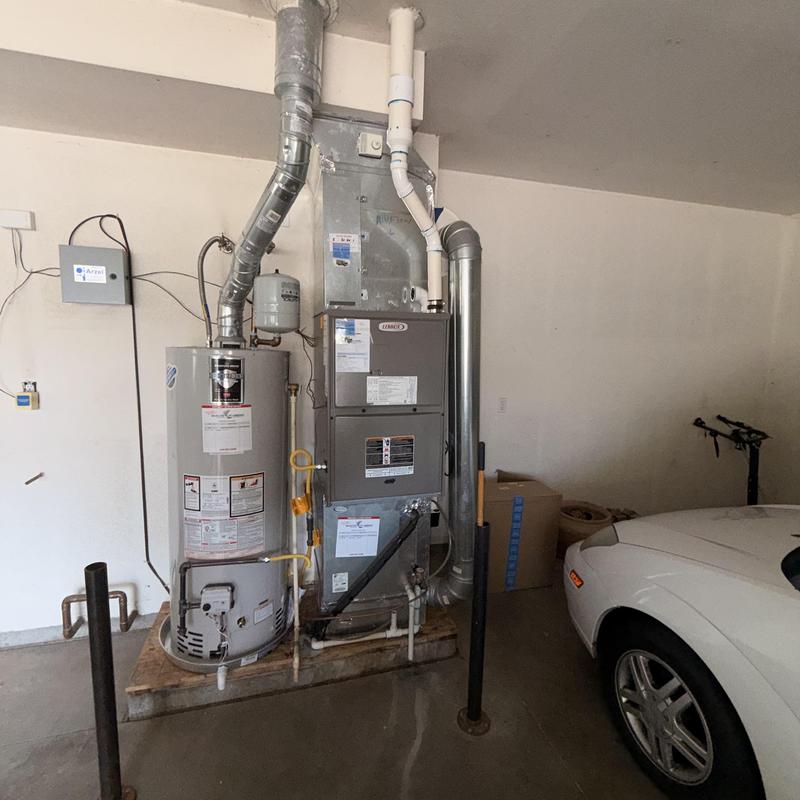 Furnace and water heater with venting and pipes Furnace and water heater with venting and pipes