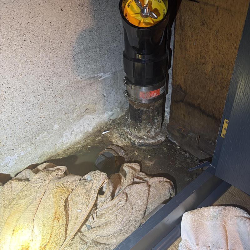 Sewer pipe with cleanout and water leak detection towels Sewer pipe with cleanout and water leak detection towels