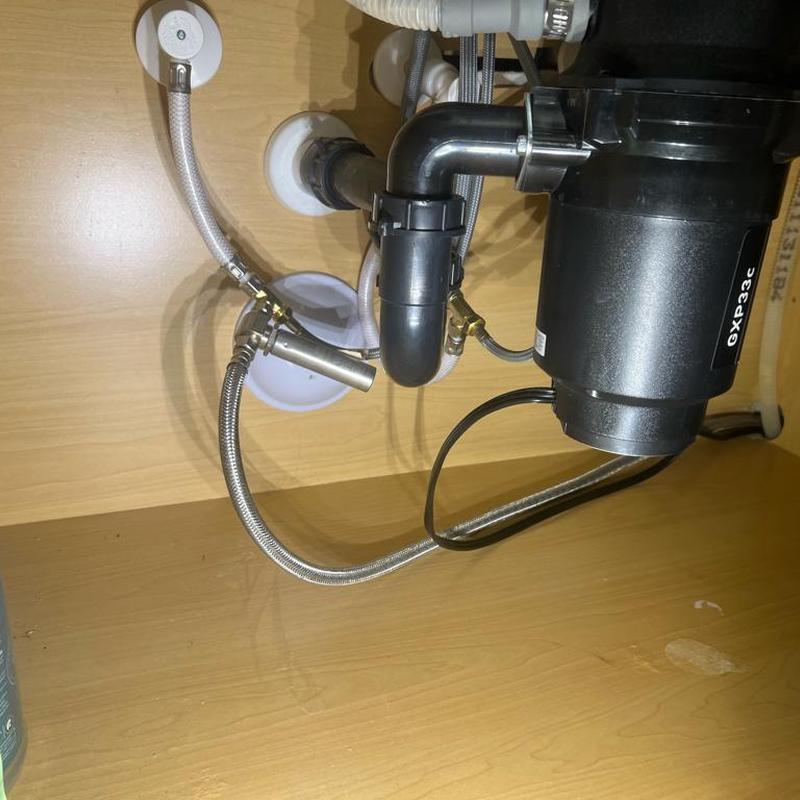 Kitchen sink clean-out cap with garbage disposal plumbing Kitchen sink clean-out cap with garbage disposal plumbing