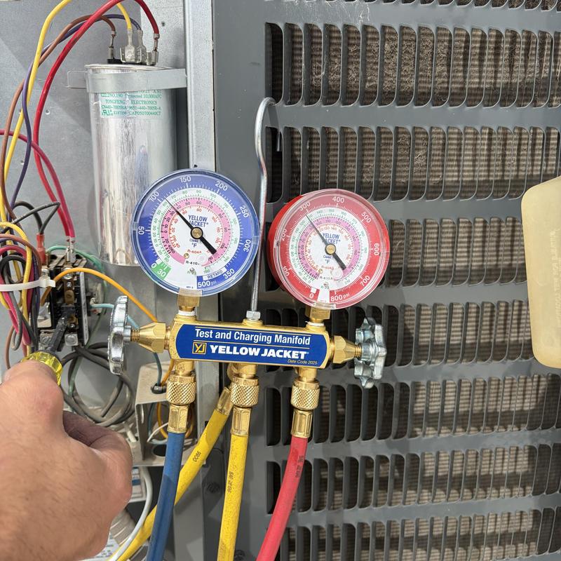 HVAC manifold gauges measuring refrigerant pressure HVAC manifold gauges measuring refrigerant pressure