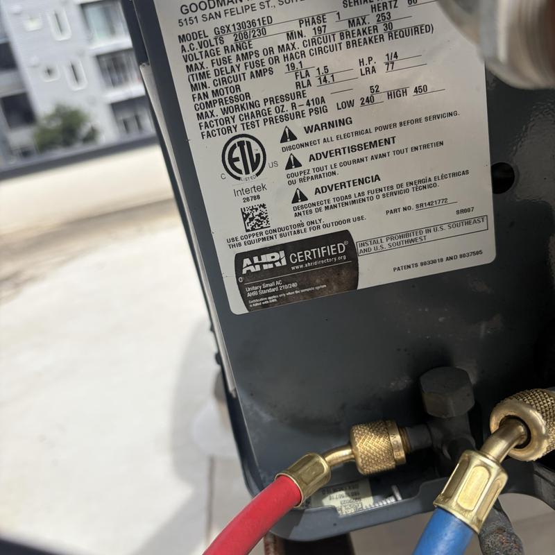 Compressor pressure gauge hoses on Goodman HVAC unit Compressor pressure gauge hoses on Goodman HVAC unit