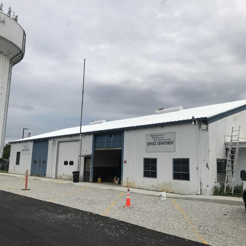 Metal corrugated roof with white elastomeric coating Metal corrugated roof with white elastomeric coating