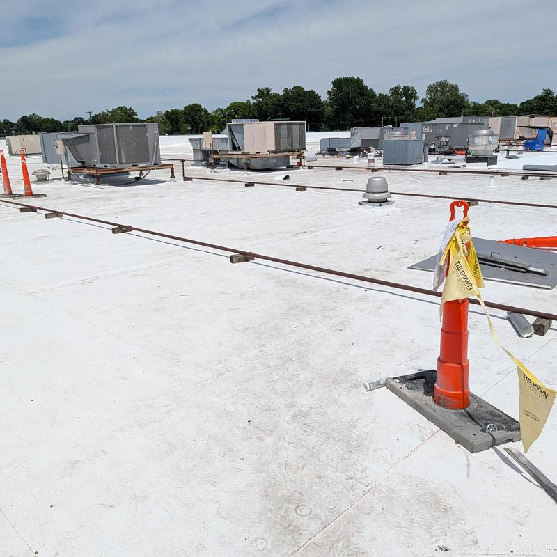 TPO single ply roofing system on commercial flat roof TPO single ply roofing system on commercial flat roof