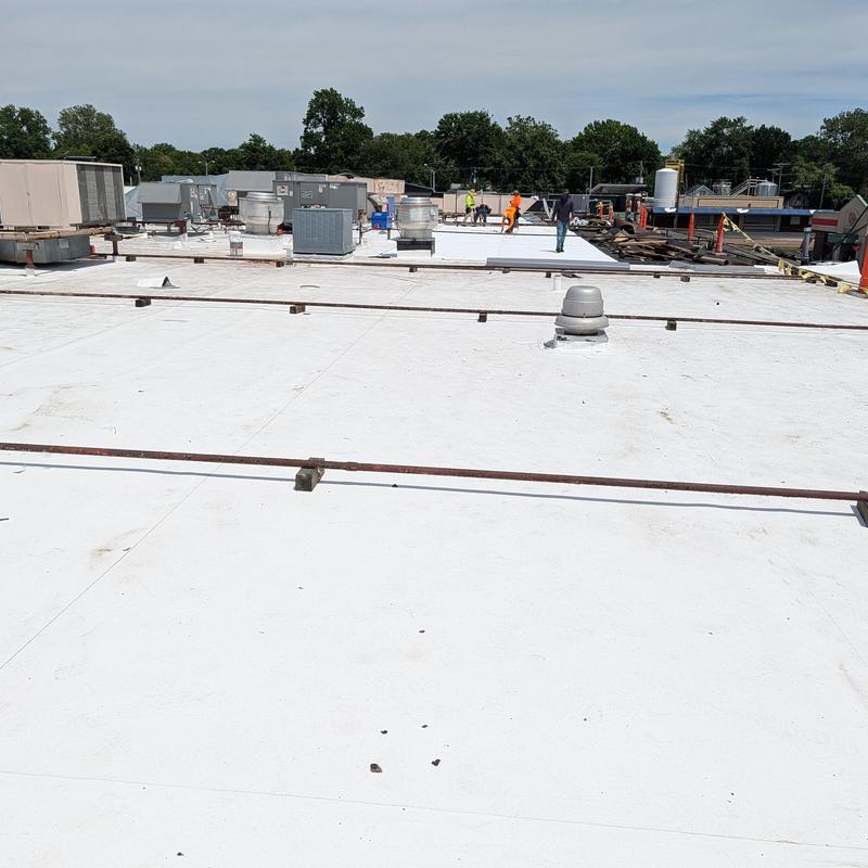 TPO single ply flat commercial roof restoration in progress TPO single ply flat commercial roof restoration in progress