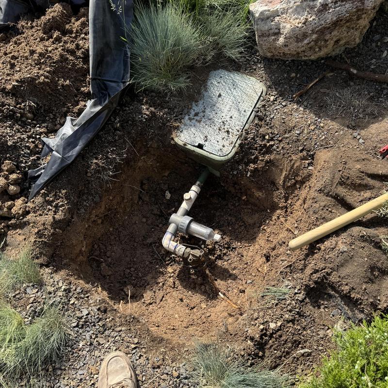 Irrigation curb stop valve in soil excavation