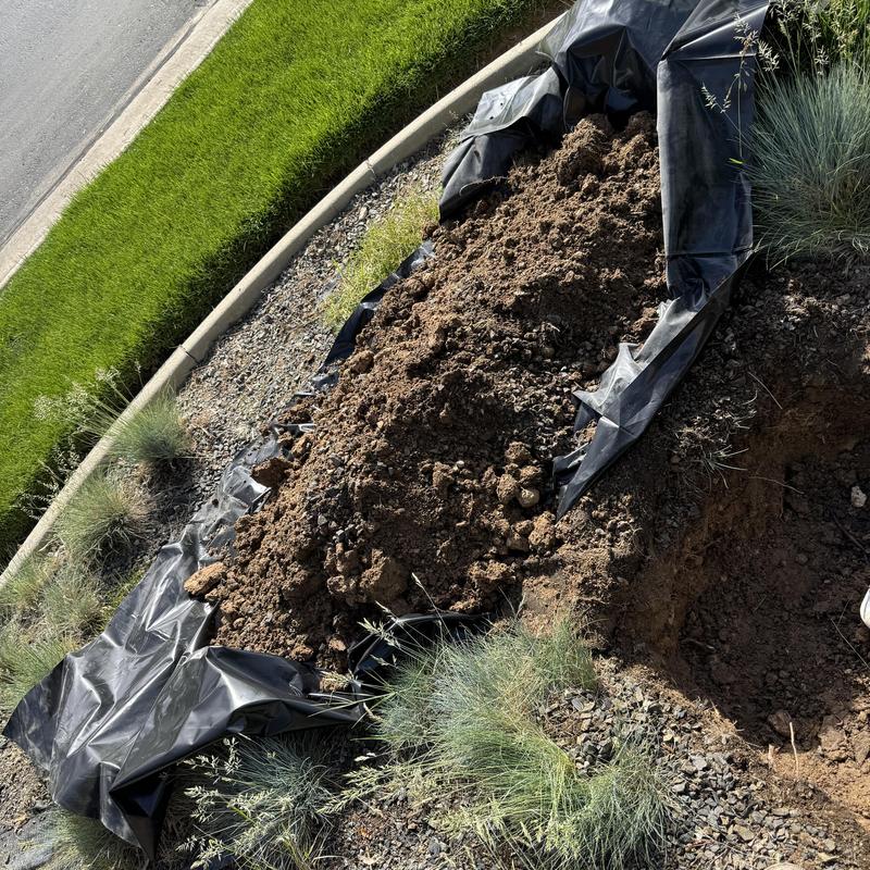 Curb stop valve irrigation system excavation in progress