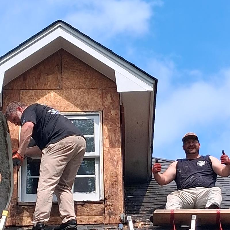 Soffit and fascia repair on house exterior in Madison