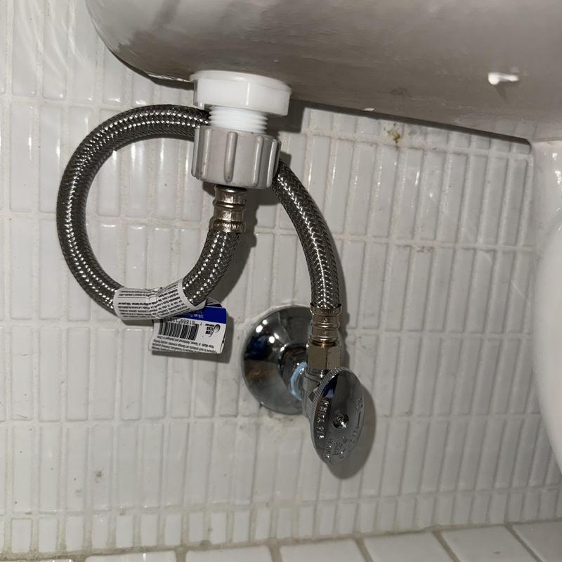 Toilet supply line with angle stop installation