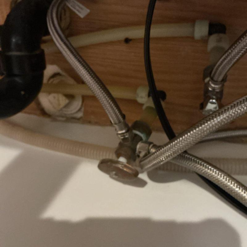 Dual outlet angle stop valve under kitchen sink