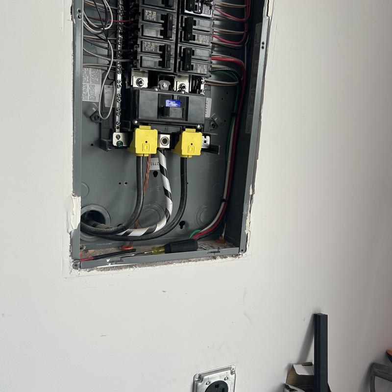 Electric panel with surge protection installation in progress Electric panel with surge protection installation in progress