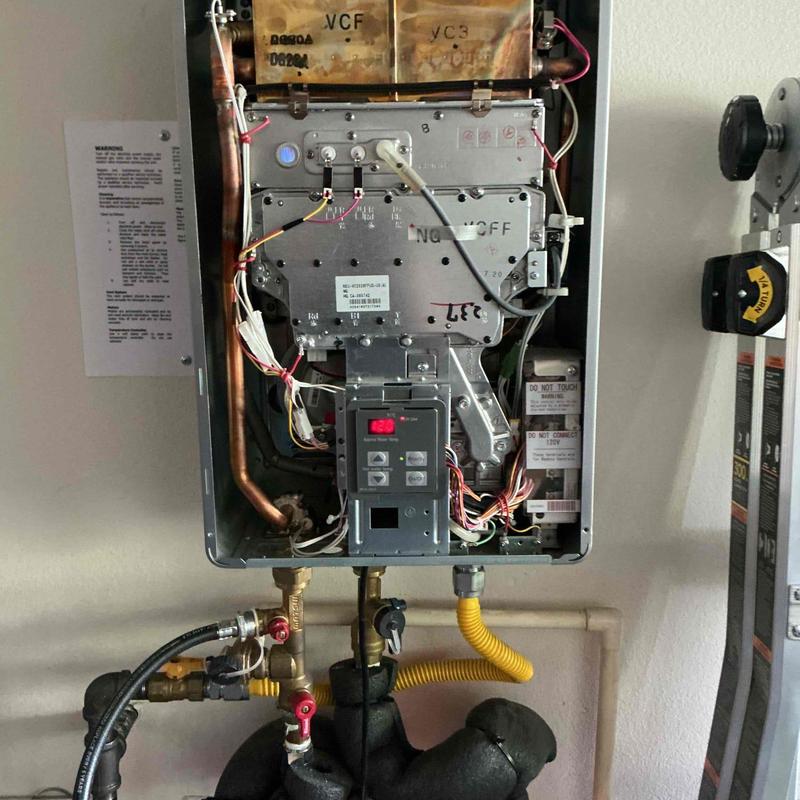 Tankless water heater internal components and piping