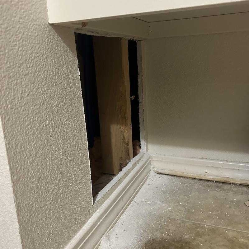 Ceiling access panel cut for plumbing leak inspection Ceiling access panel cut for plumbing leak inspection