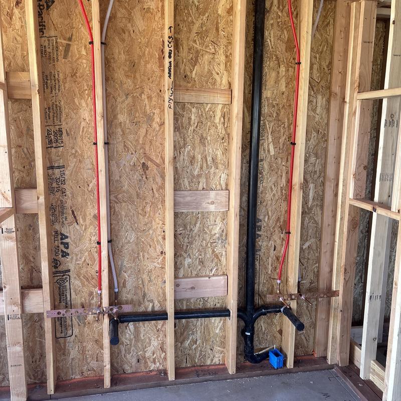 Shower plumbing rough-in with hot and cold water lines