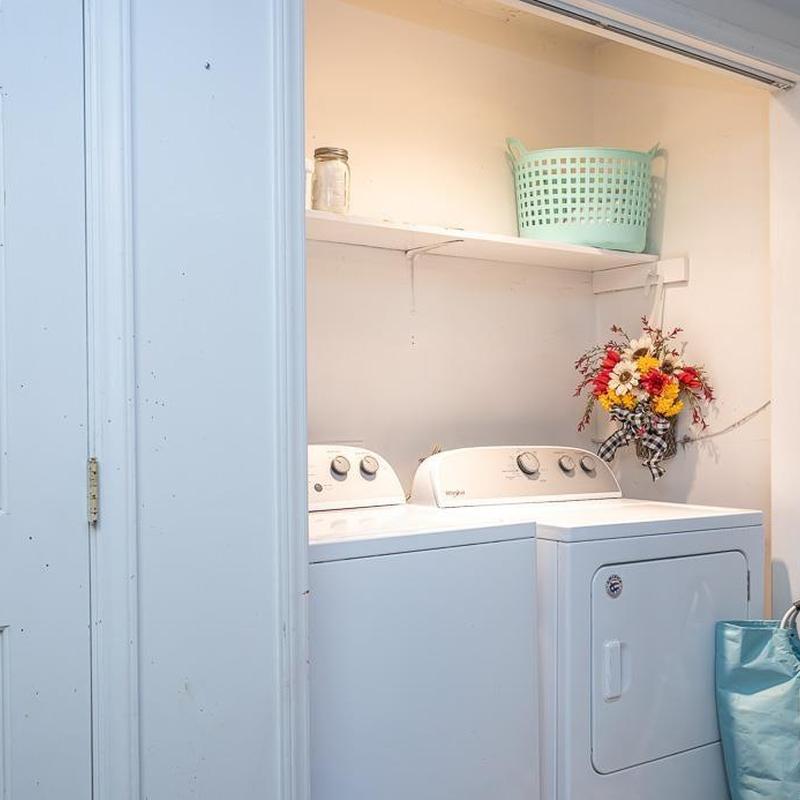 Laundry washer and dryer unit with shelf and decor Laundry washer and dryer unit with shelf and decor