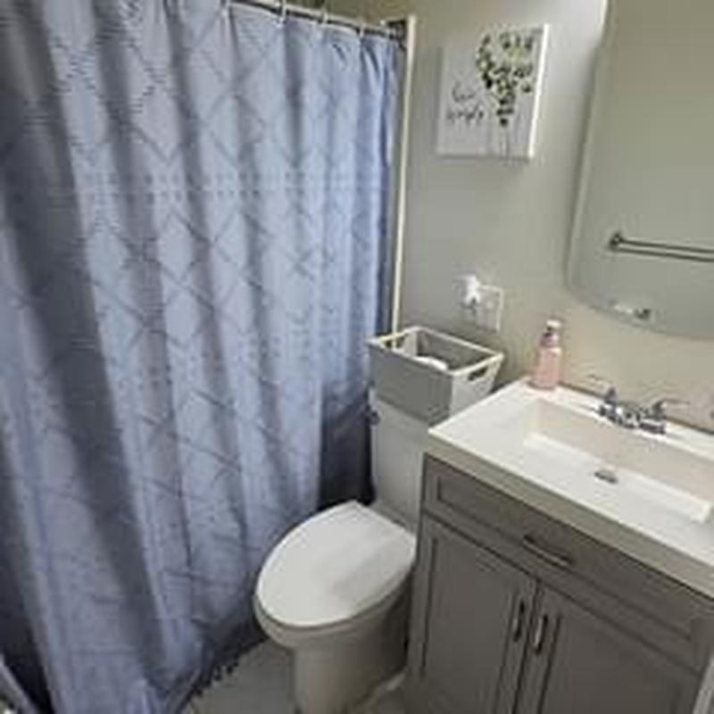 Lavatory faucet with two handles installed in bathroom Lavatory faucet with two handles installed in bathroom