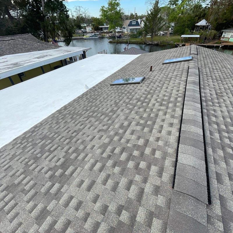 Low E skylights on architectural shingle roof Low E skylights on architectural shingle roof