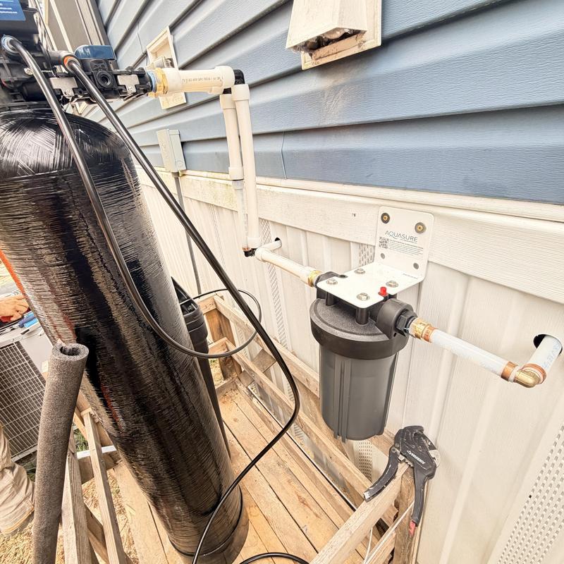 Whole home water filtration system with Uponor piping installation