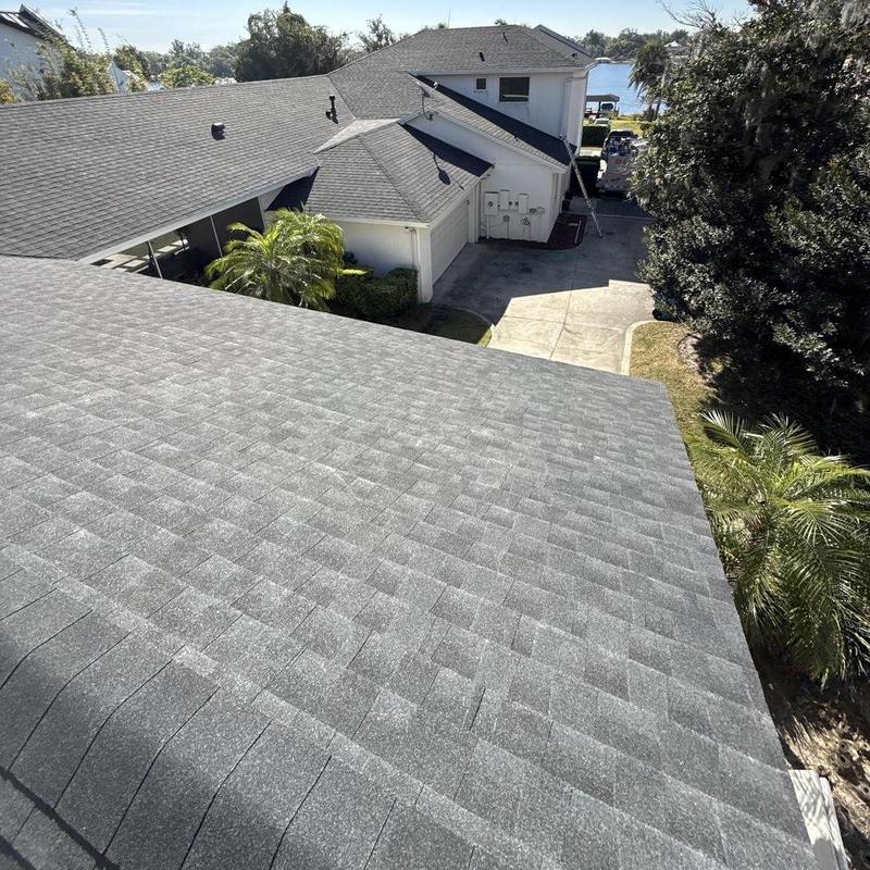 Architectural shingle roof installation on residential home Architectural shingle roof installation on residential home