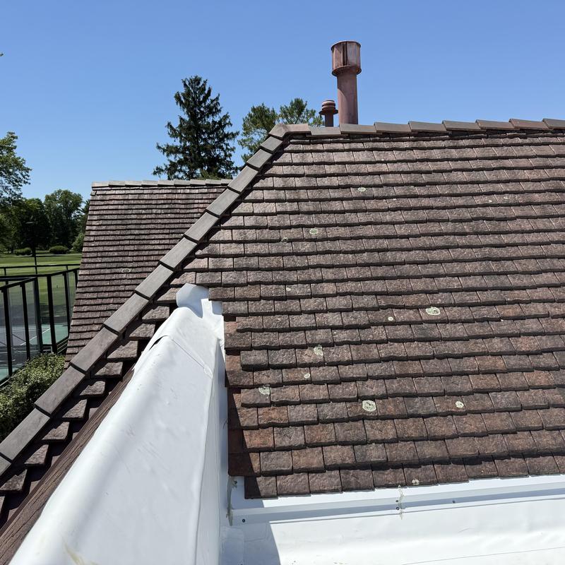 Brava synthetic clay tile roofing with TPO tie-in