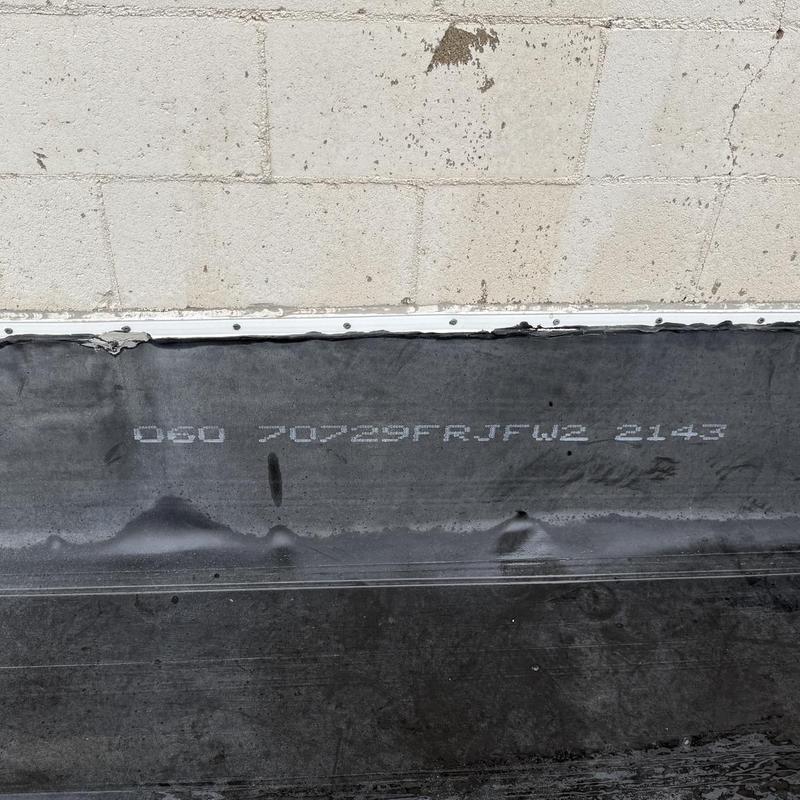 Carlisle Sure-Seal EPDM roof cover strip installation