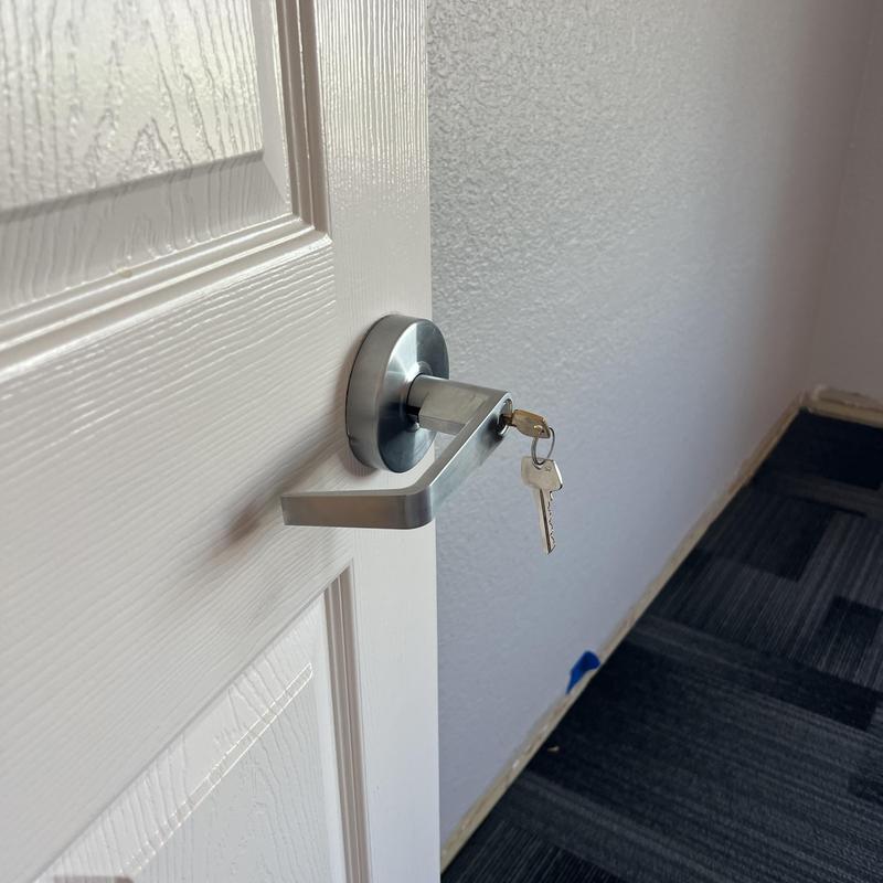 Office door lock with key inserted