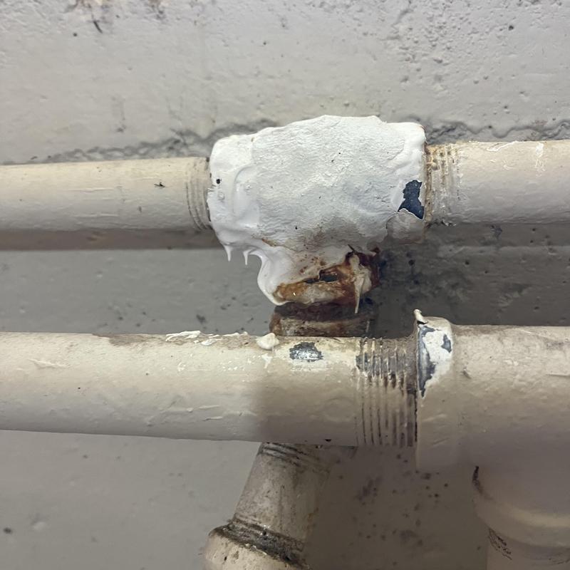 Galvanized pipe joints with corrosion and repair attempts Galvanized pipe joints with corrosion and repair attempts