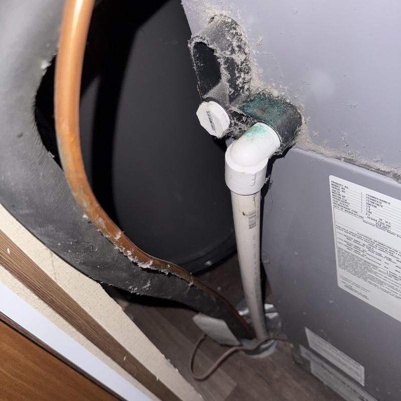 HVAC condensate drain pipe and refrigerant line connection HVAC condensate drain pipe and refrigerant line connection