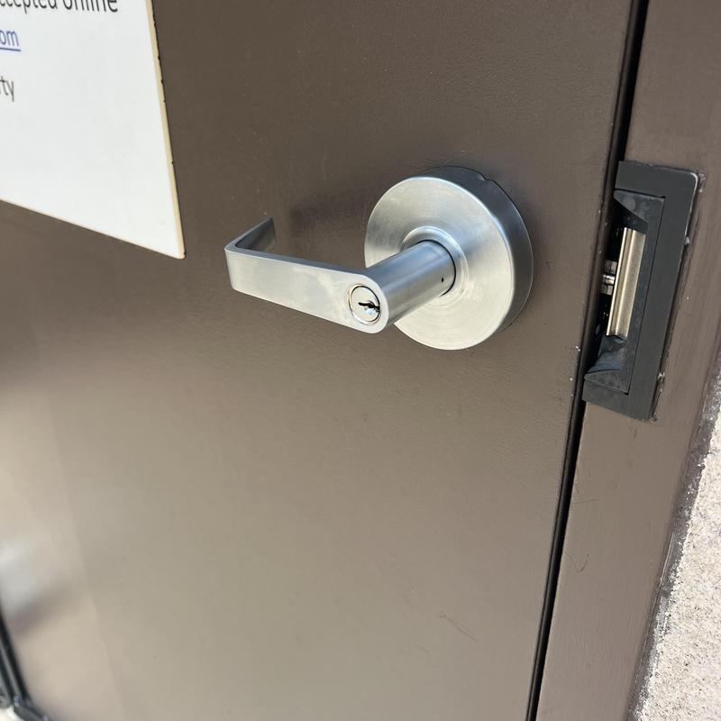 Door lock lever and cylinder with new rekeyed key