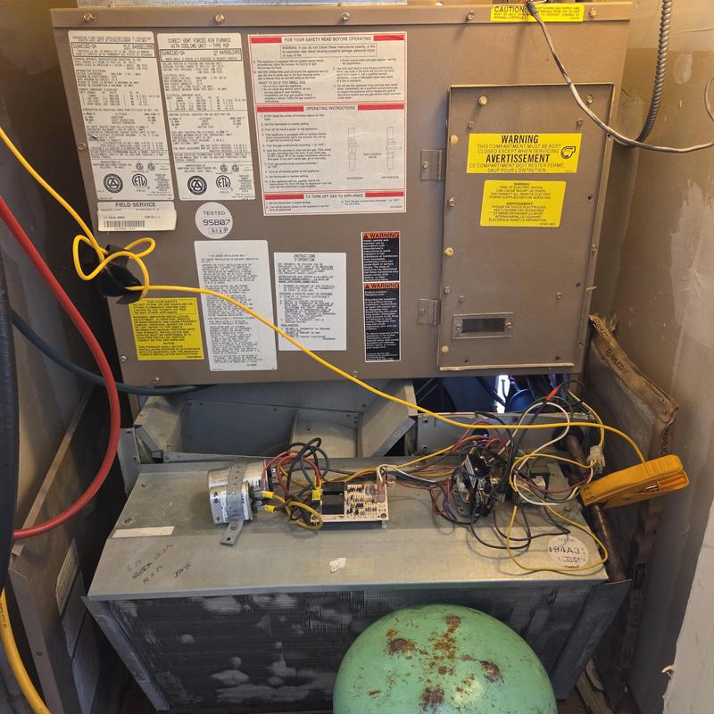 Furnace control board and wiring inspection with meter Furnace control board and wiring inspection with meter