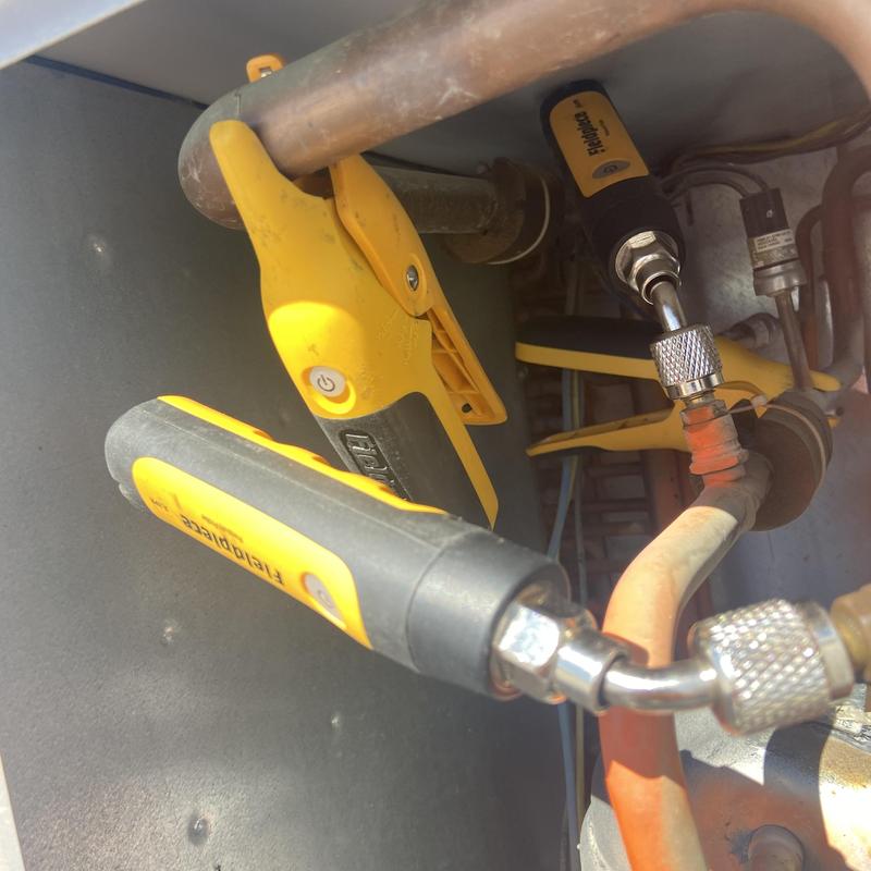 Rooftop unit refrigerant leak detection tools attached Rooftop unit refrigerant leak detection tools attached