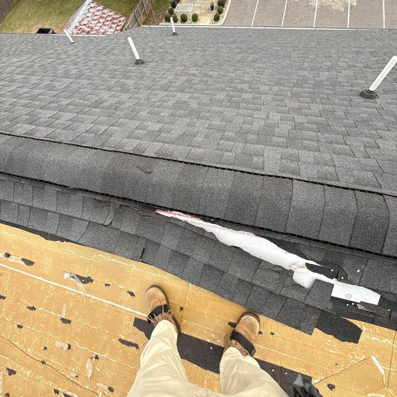 Asphalt shingles with ridge damage and removal process