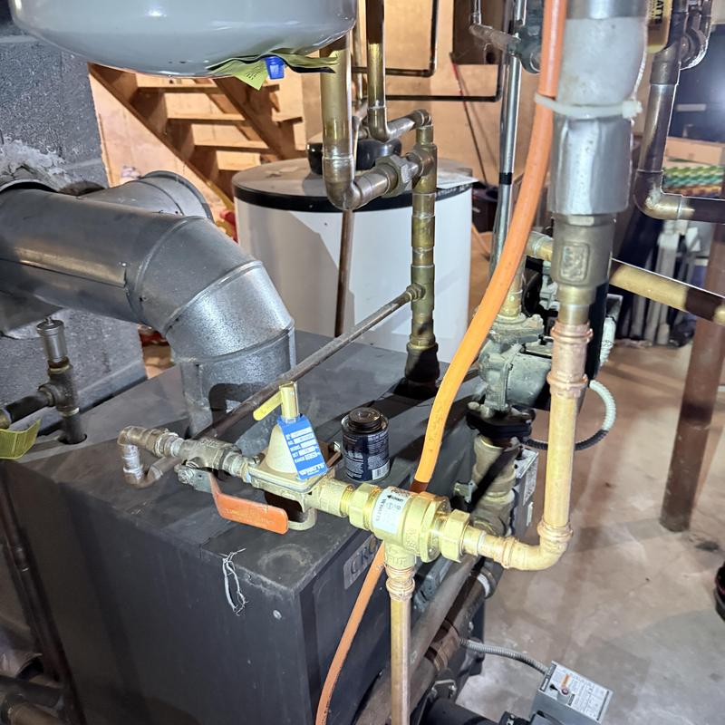 Boiler expansion tank with valves and piping installation