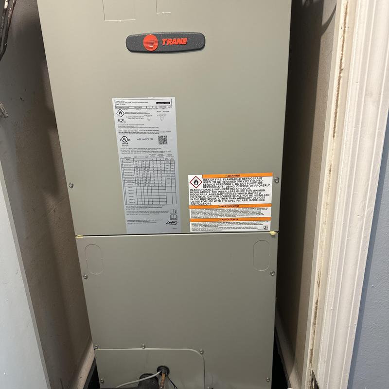 Trane air handler system installed in utility closet Trane air handler system installed in utility closet