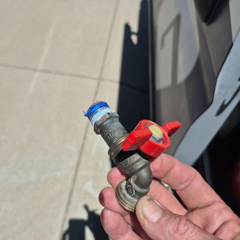 Hose bib valve with red handle threaded connection
