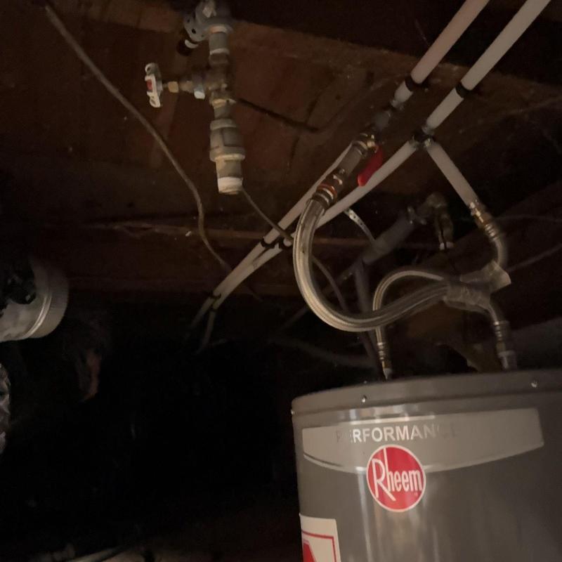 Water heater plumbing connections and PEX piping installation