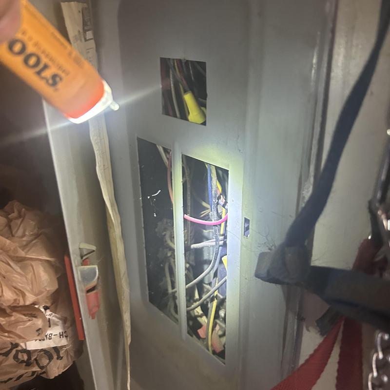 Electrical panel wiring inspection with flashlight illumination Electrical panel wiring inspection with flashlight illumination