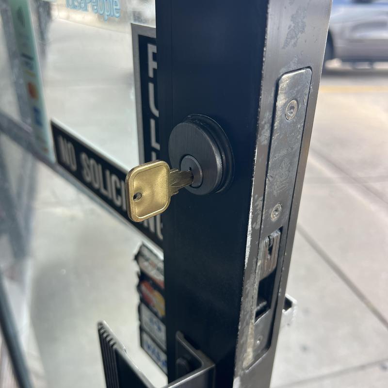 Mortise lock cylinder with key in commercial door