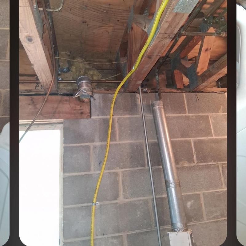 Gas line installation for dryer in basement wall