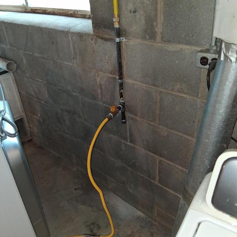 Dryer gas line installation with yellow hose connection
