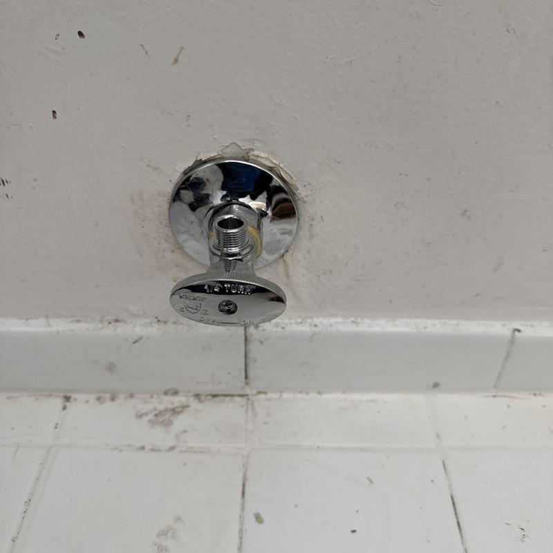 Angle stop valve installation on tiled wall