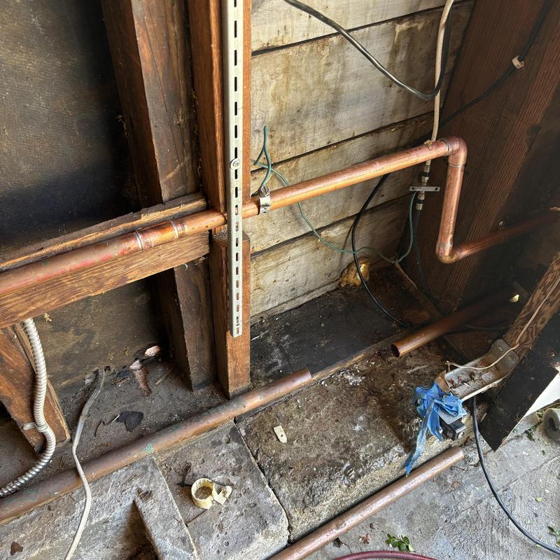 Copper water line relocation behind wall studs