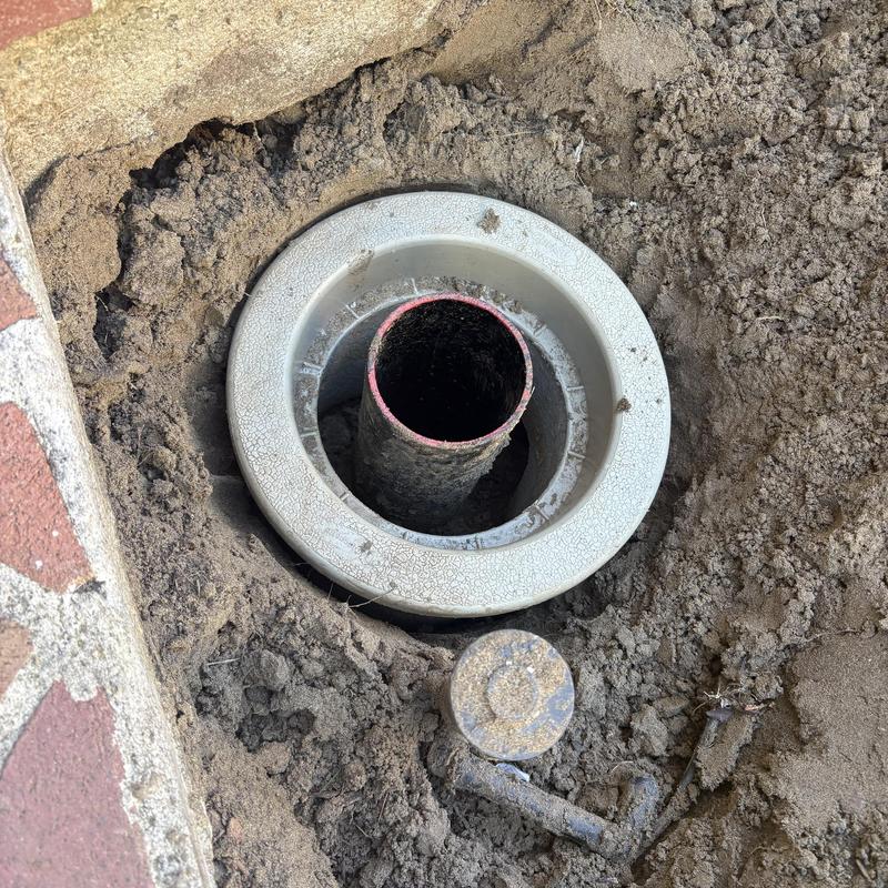Irrigation valve box installation in soil trench