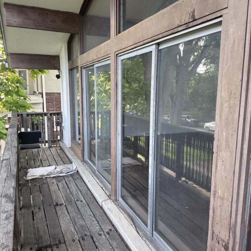 Sliding door frames and glass windows on balcony Sliding door frames and glass windows on balcony
