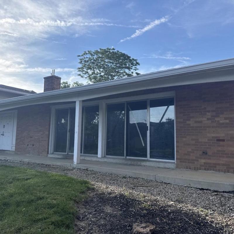 Sliding glass door removal and window replacement exterior view Sliding glass door removal and window replacement exterior view