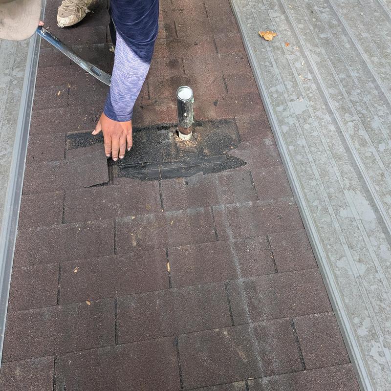 Roof vent flashing and shingle repair on asphalt roof Roof vent flashing and shingle repair on asphalt roof